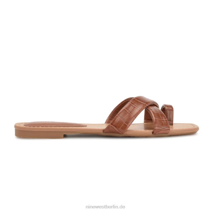 Nine West RR2J1073Gepunktete flache Slide-Sandalen sattes, kaffeegeprägtes Krokomuster